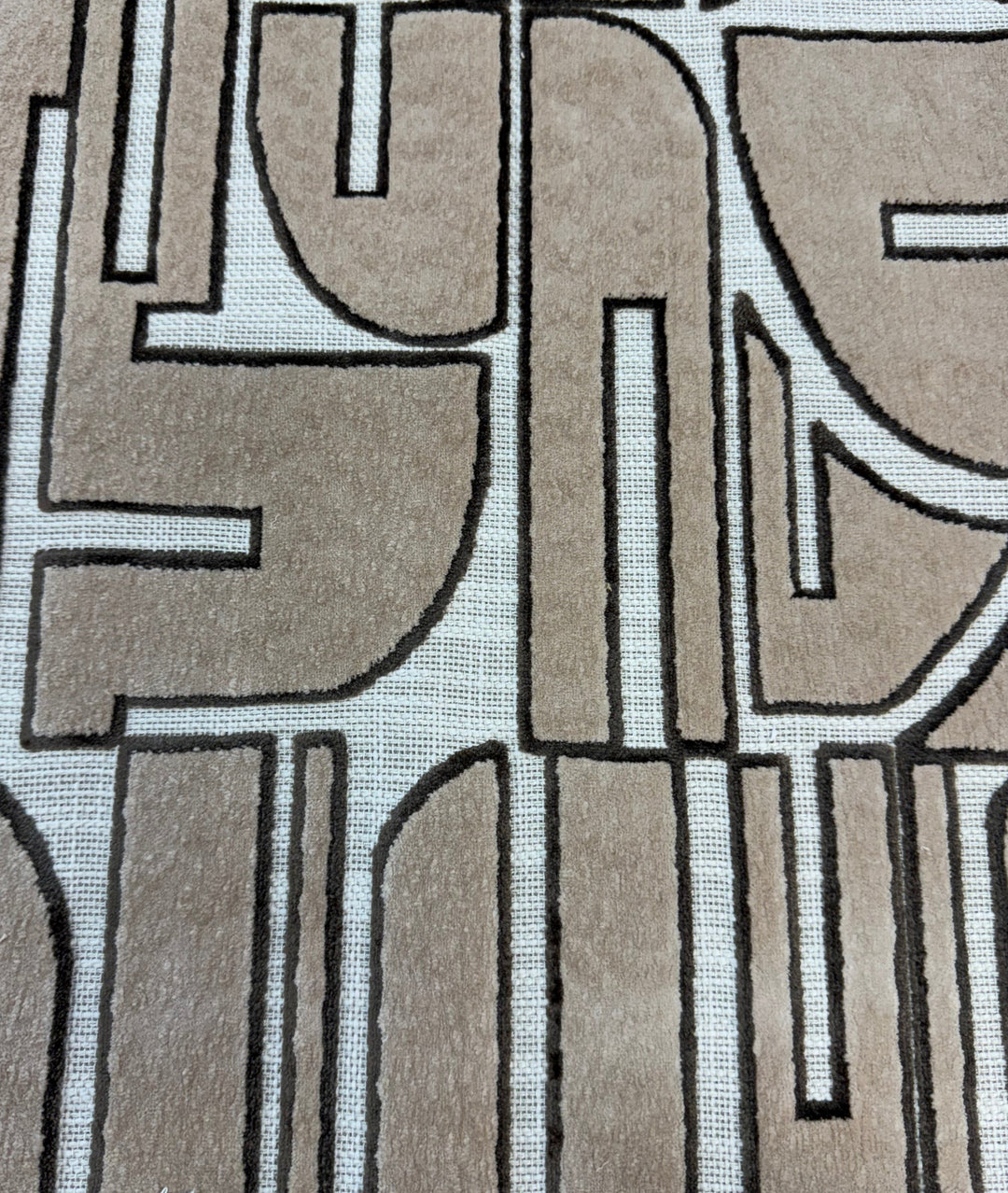 Textile sample with abstract pattern on a neutral background