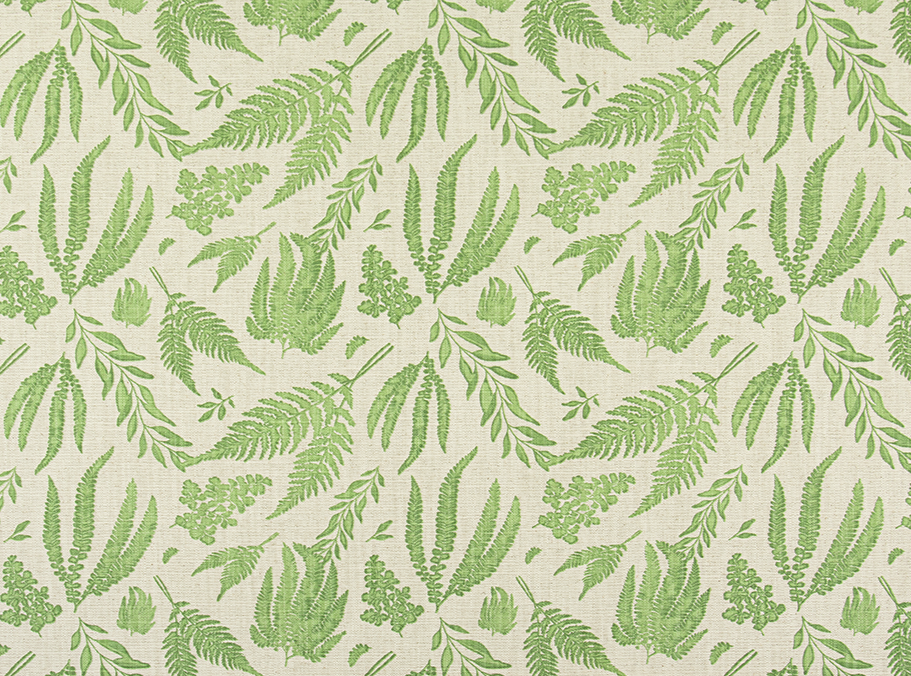 Green leaf pattern on beige fabric
