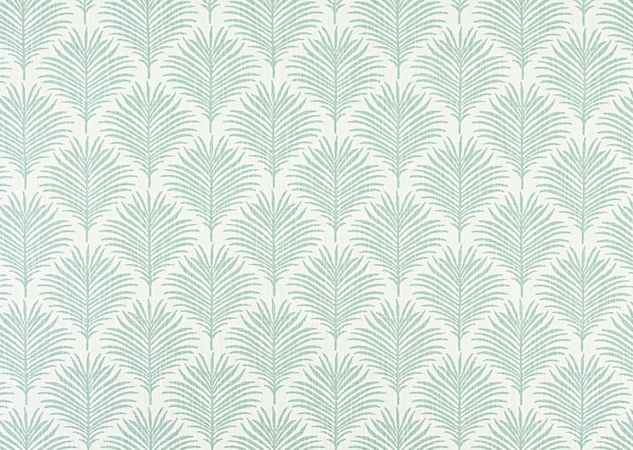 Patterned fabric with palm leaf design on a light blue background