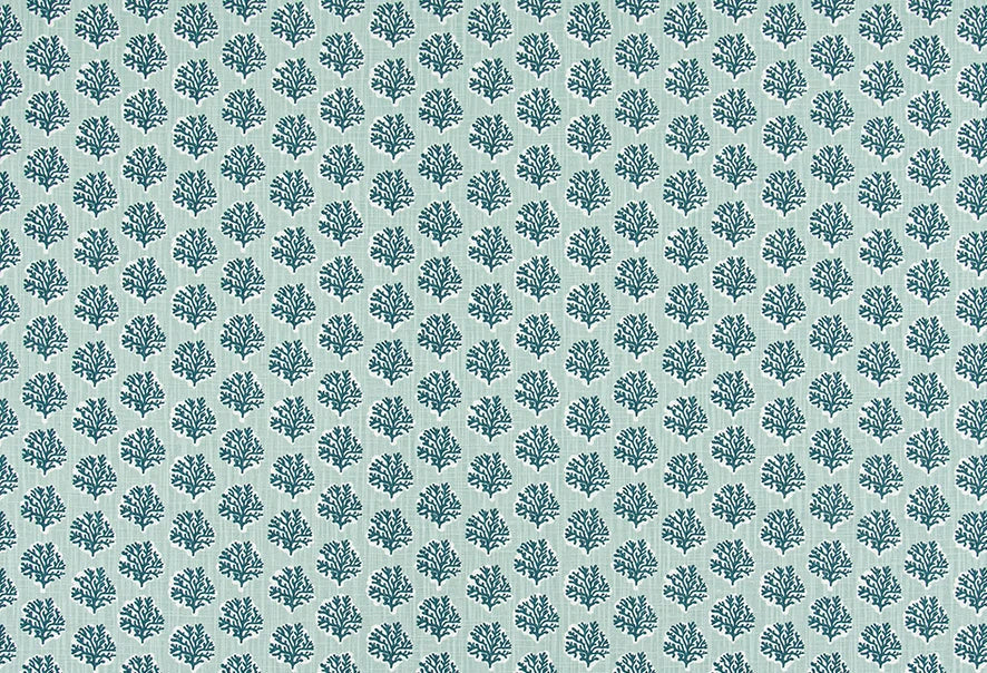 Patterned fabric with blue coral design on a light blue background