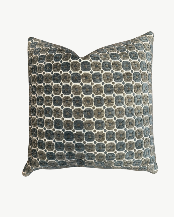 green and blue geometric velvet pillow