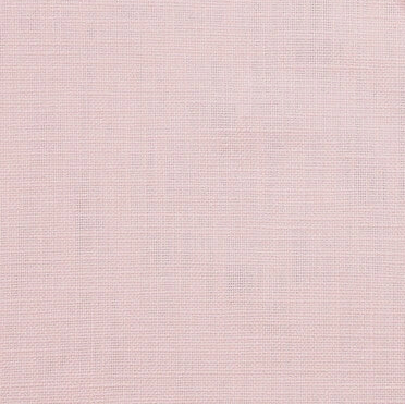 Close-up of pink fabric with a subtle pattern