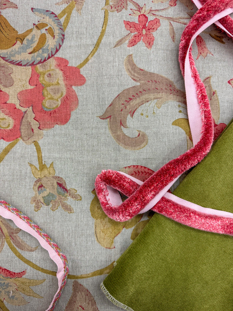 floral fabric with caterpillar fringe and green velvet