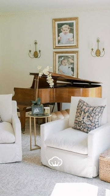 sitting room with floral black pillows
