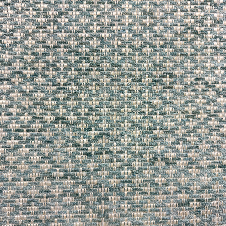 Textured blue and gray patterned fabric swatch