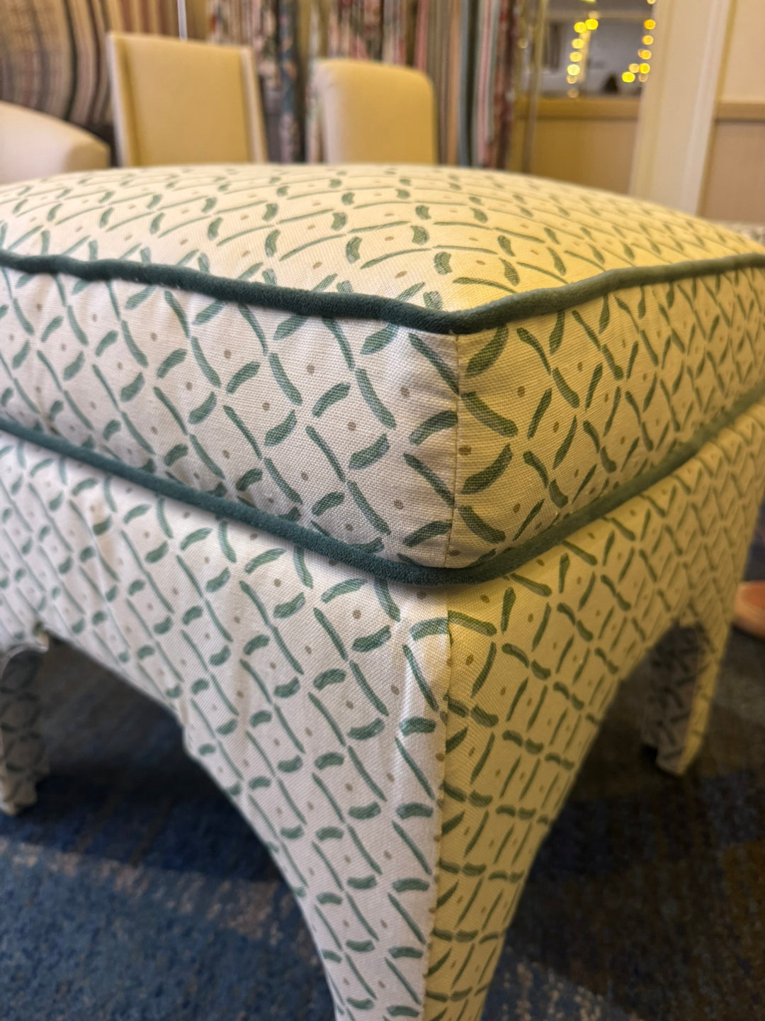 floral fabric ottoman with contrast cording