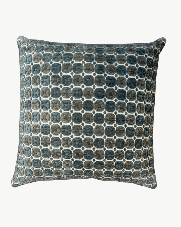green and blue geometric velvet pillow