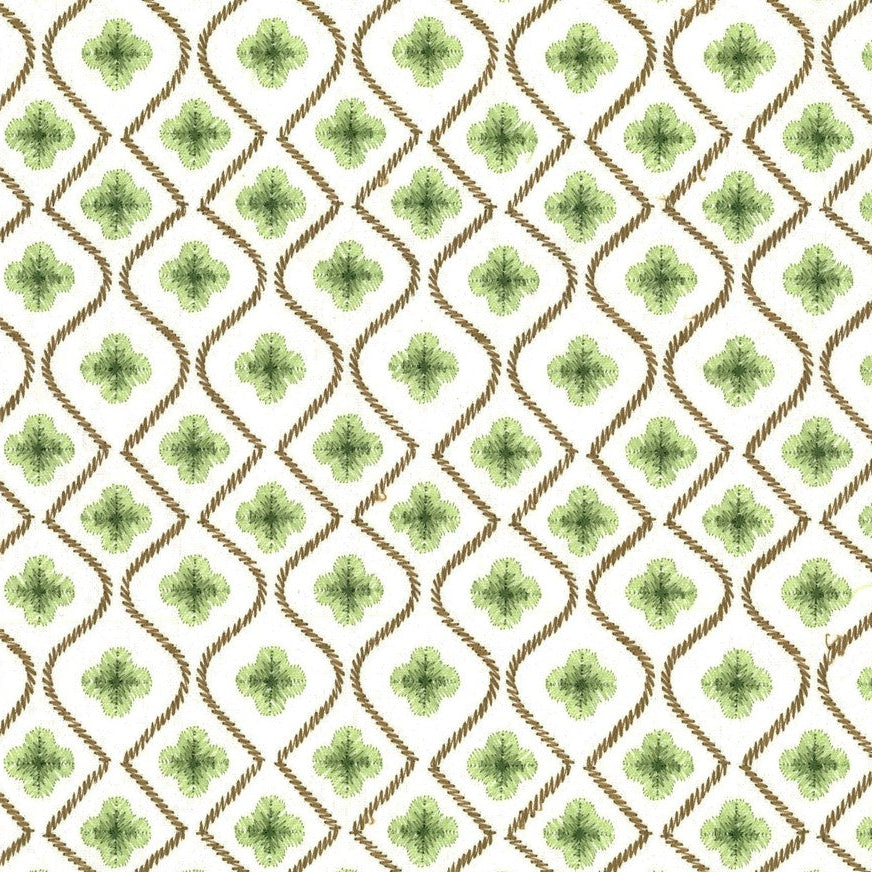 green and brown floral embroidered fabric