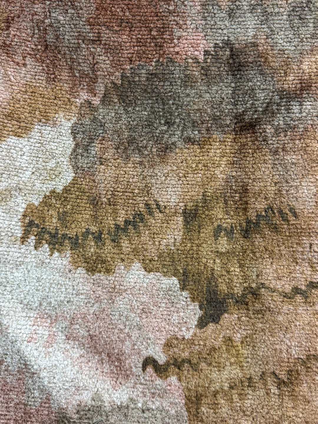 Close-up of a textured fabric with earthy tones