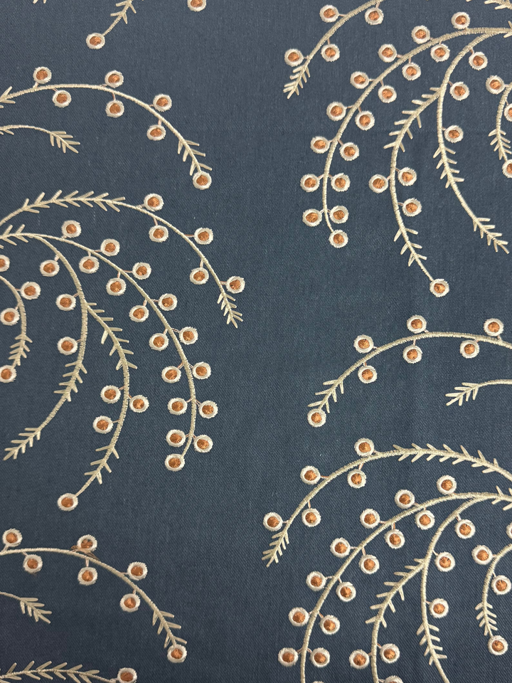 Fabric with floral pattern on a blue background