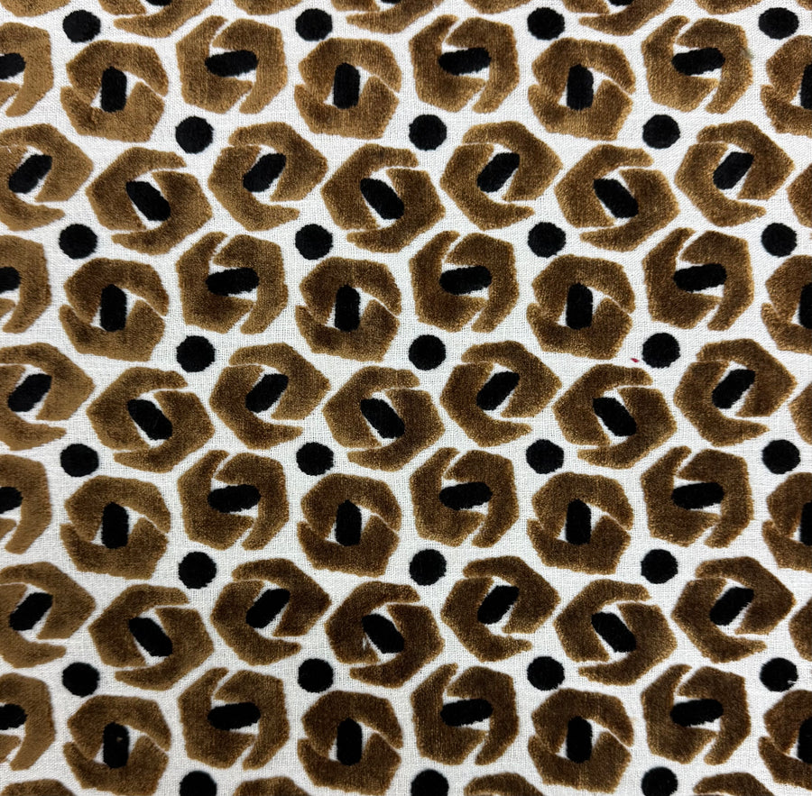 Pattern of brown and black shapes on a white background
