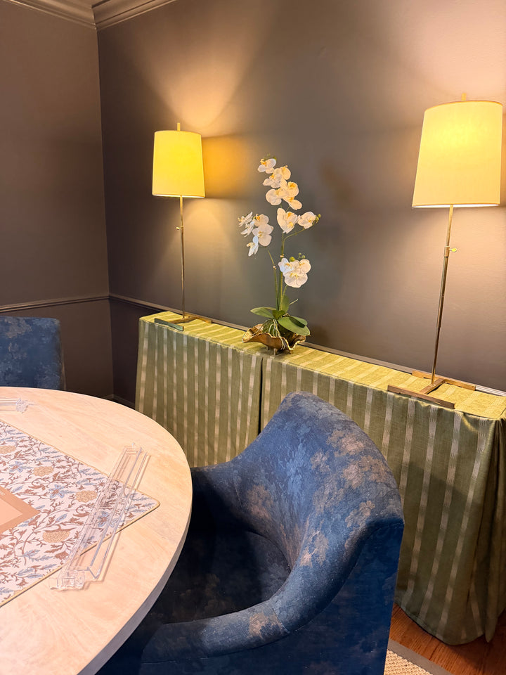 green striped table skirt in formal dining room with orchid