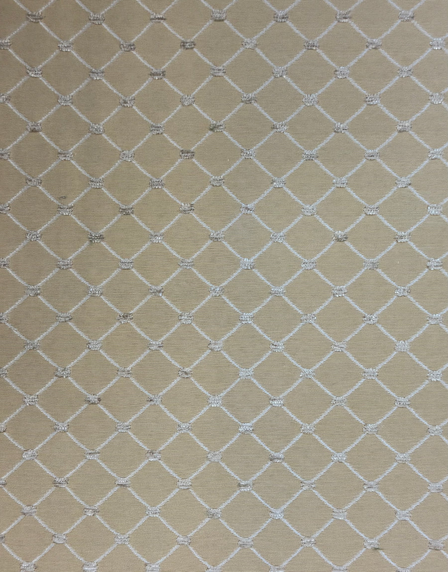 Beige fabric with a white geometric diamond lattice pattern.
