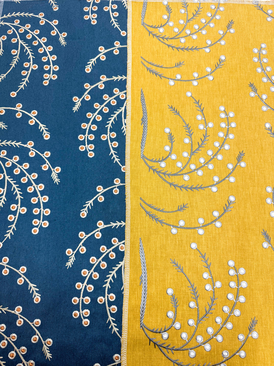 embroidered fabric swatches blue and yellow