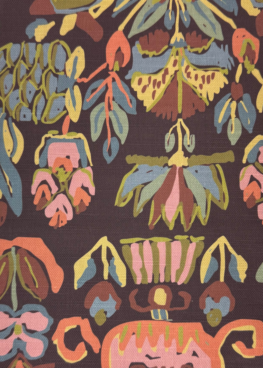 Colorful floral pattern on a brown background