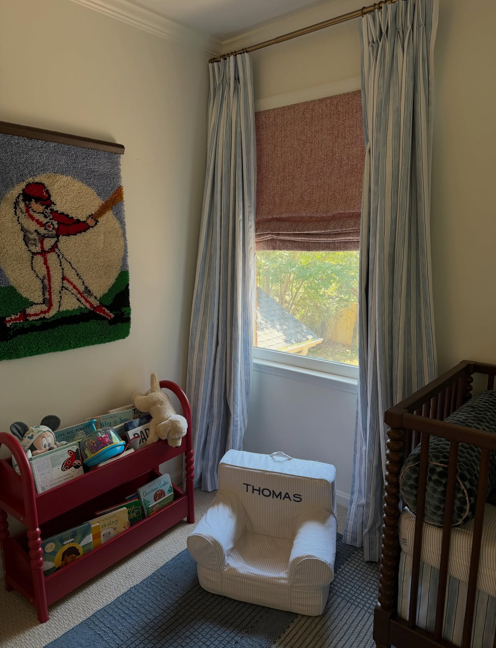 Blue striped drapes in nursery 