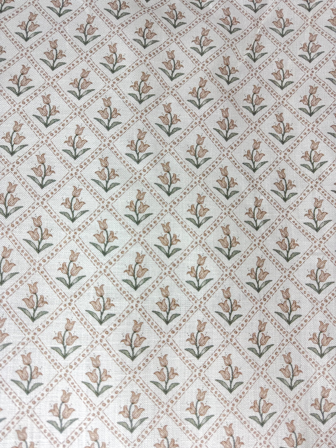 Patterned fabric with floral design on a white background
