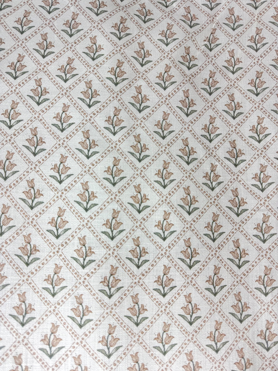 Patterned fabric with floral design on a white background