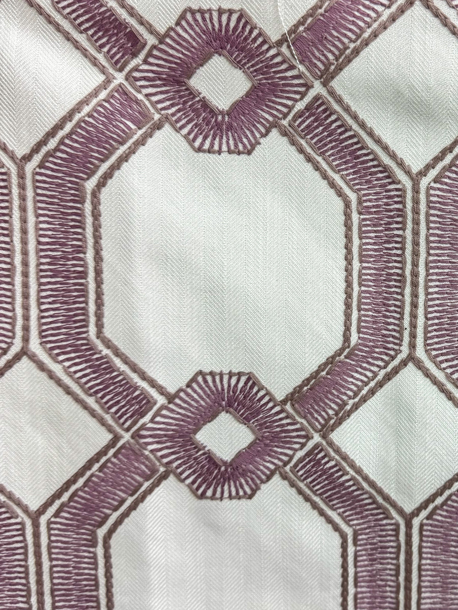 lavender geometric and embroidered fabric