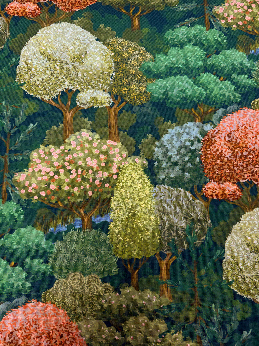 Colorful pattern of trees and bushes on a dark green background