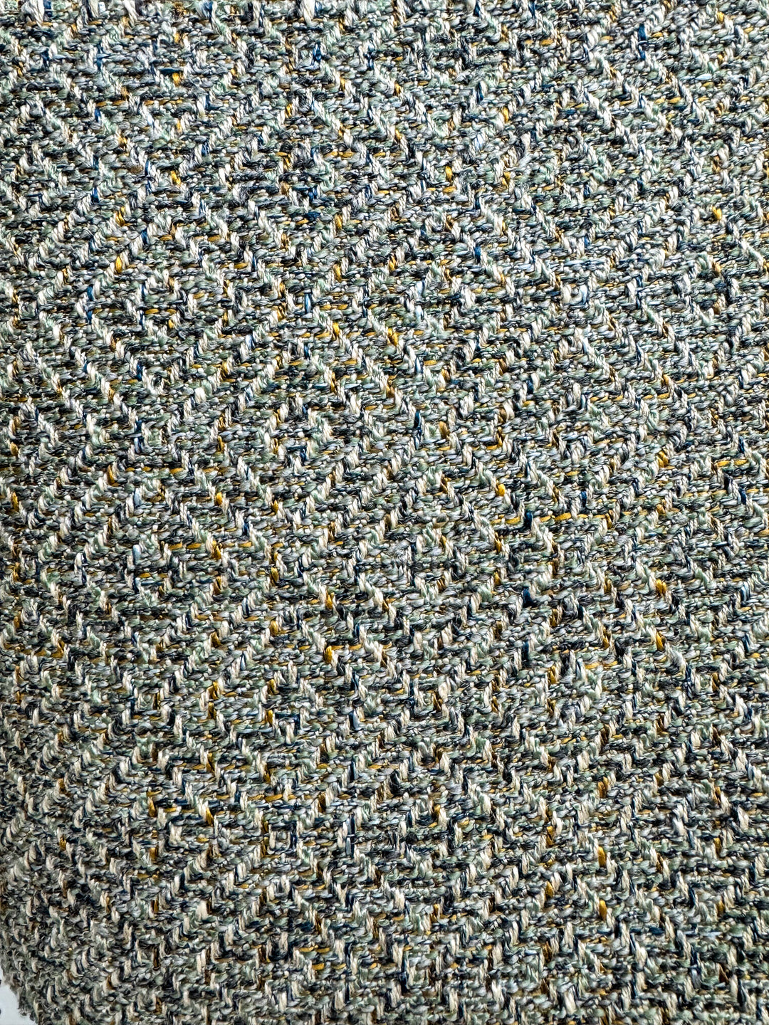 textured teal and blue woven fabric