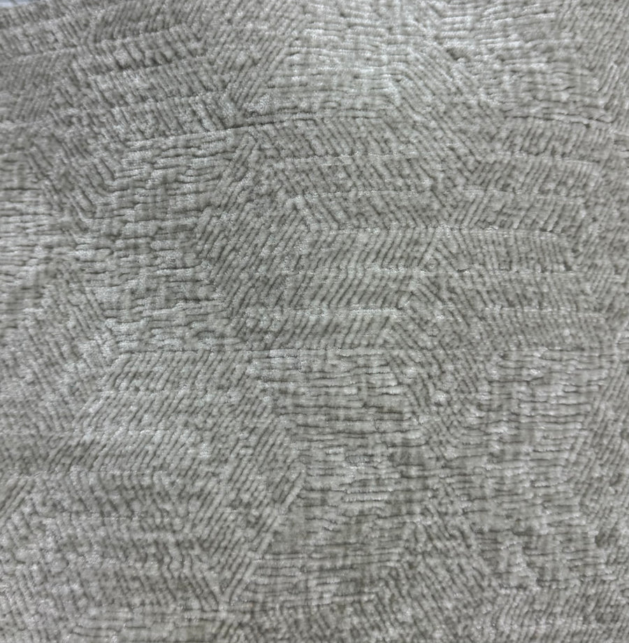 Close-up of textured gray fabric with a subtle pattern
