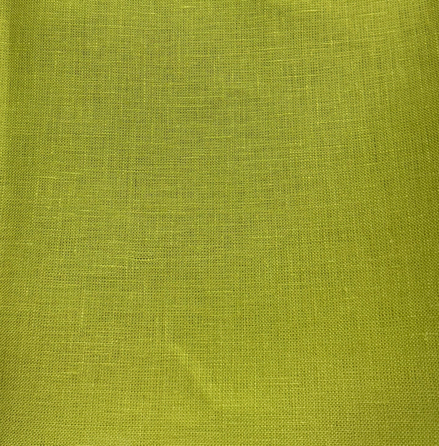 Solid green fabric texture swatch