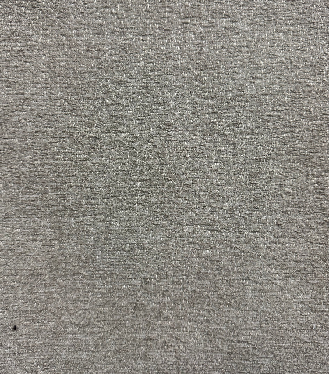 Close-up of a textured gray fabric surface