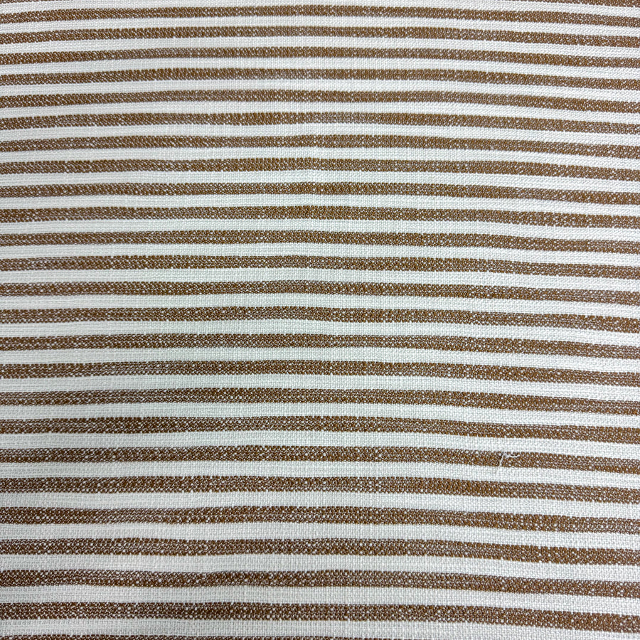 brown and white striped fabric