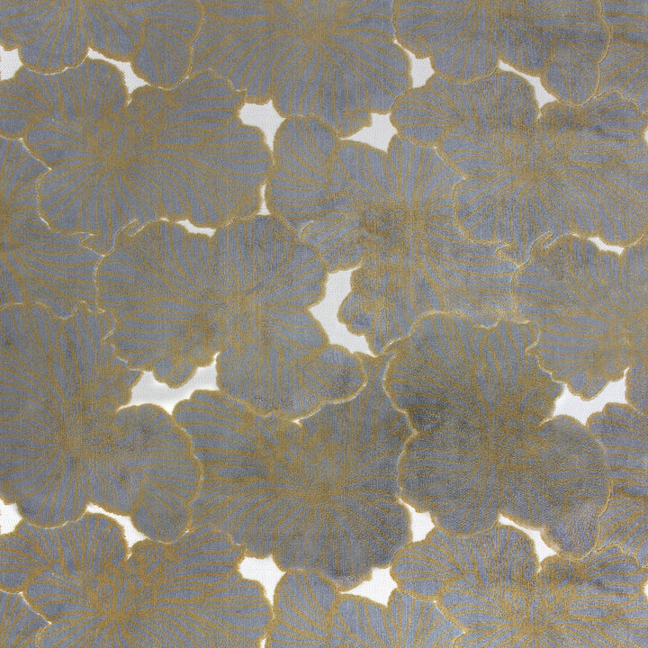 A fabric with a floral pattern in a copper color on a grey background.