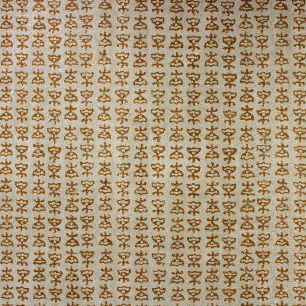Textured fabric with a subtle pattern on a beige background