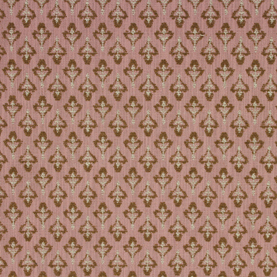 Patterned fabric with brown and beige design on a pink background