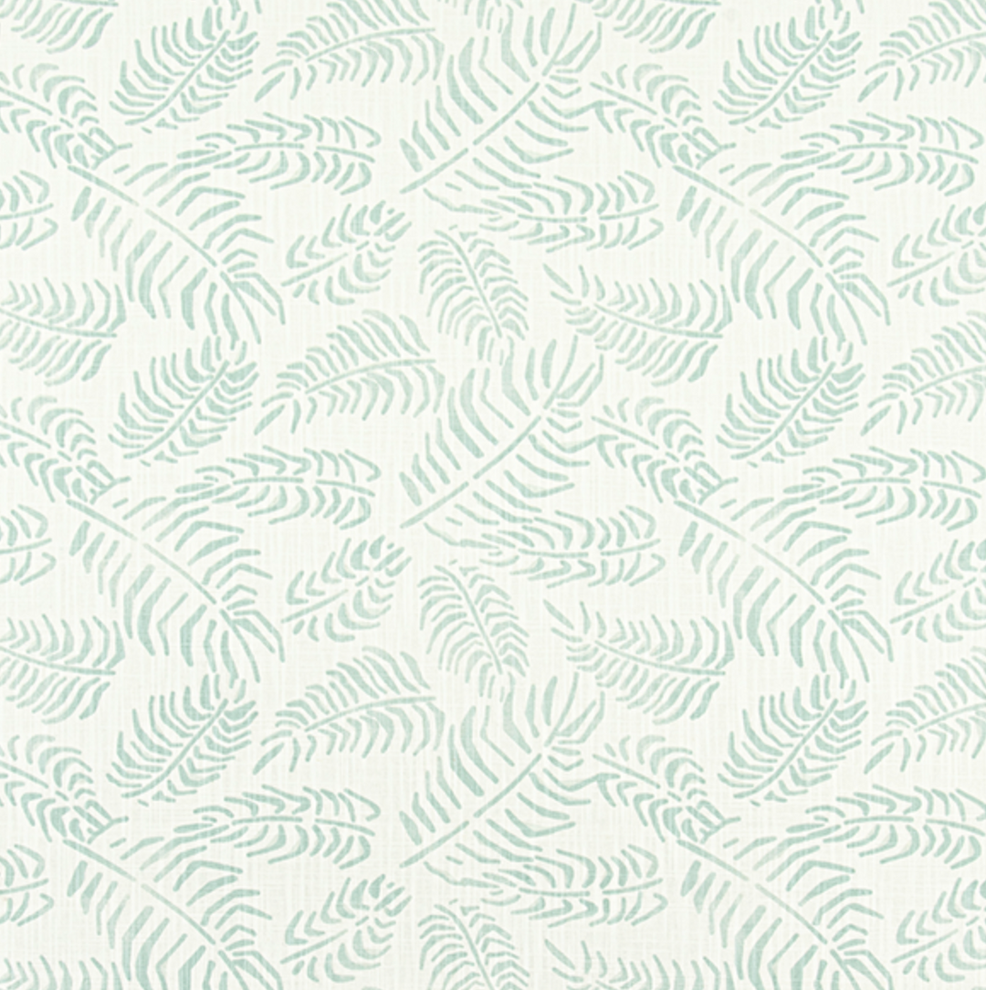 Pattern of light green leaves on a white background