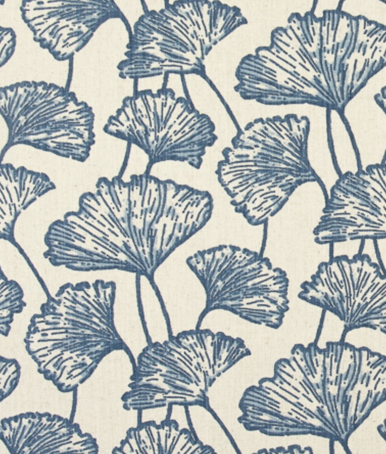 Pattern of blue leaves on a beige background
