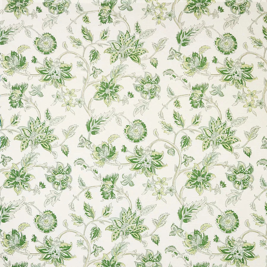 green and white floral fabric with a white background