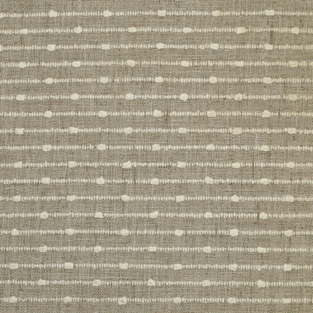 Textured fabric pattern with small white lines on a beige background