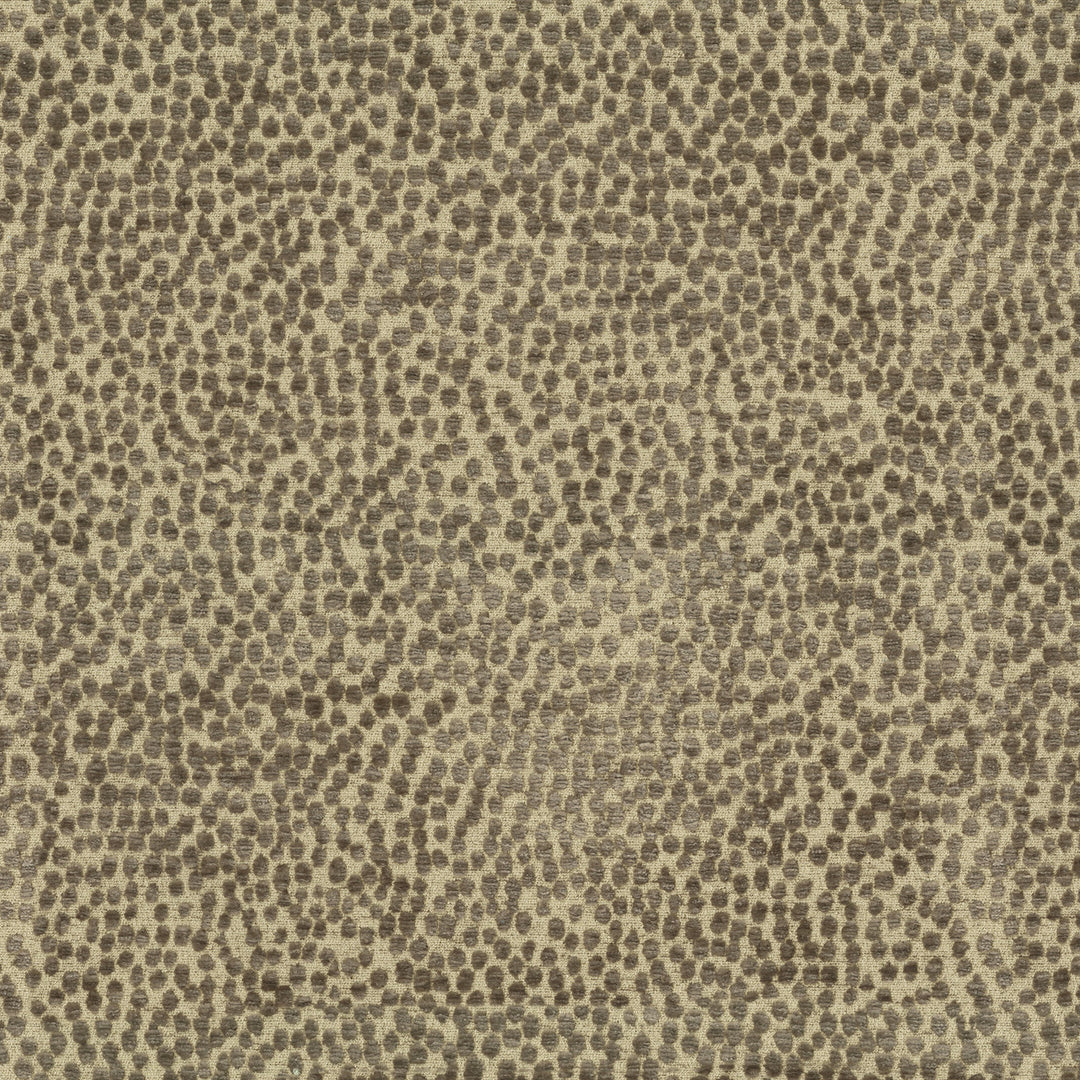 Textured fabric pattern with brown and beige colors