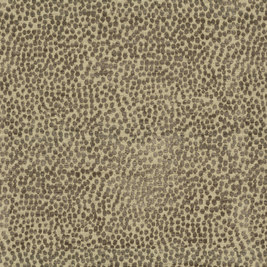 Textured fabric pattern with brown and beige colors